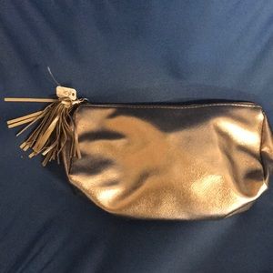 Brand new goldish make up bag